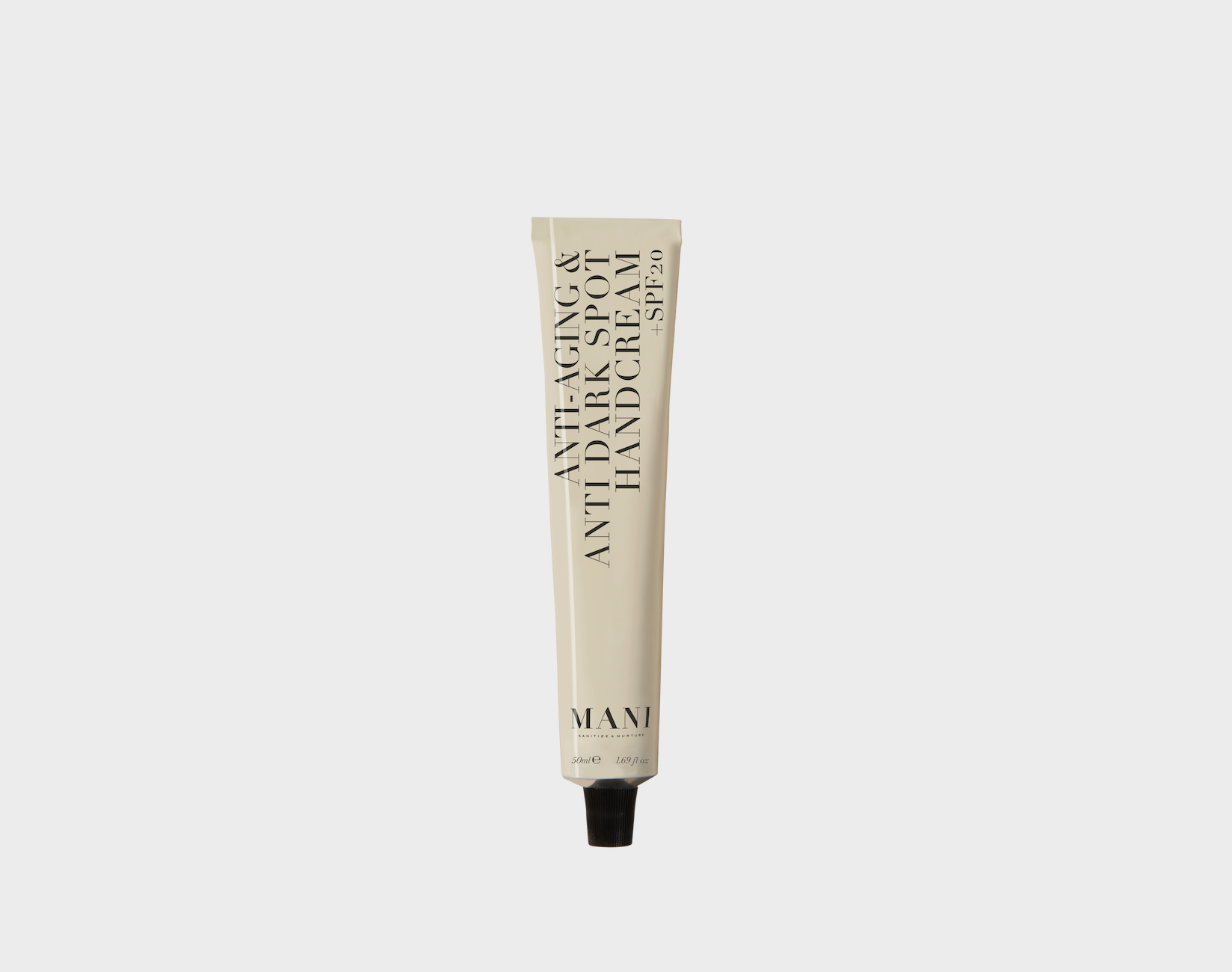 Mani anti-aging hand cream tube on a white background