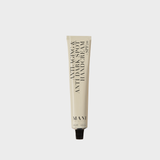 Mani anti-aging hand cream tube on a white background