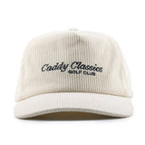 Beige cap with 'Caddy Classics Golf Club' text on a white background