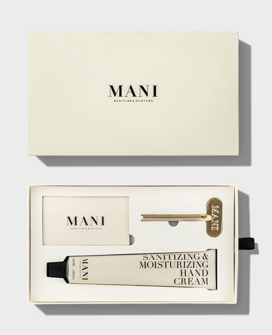 Mani sanitizing and moisturizing hand cream with packaging on a white background