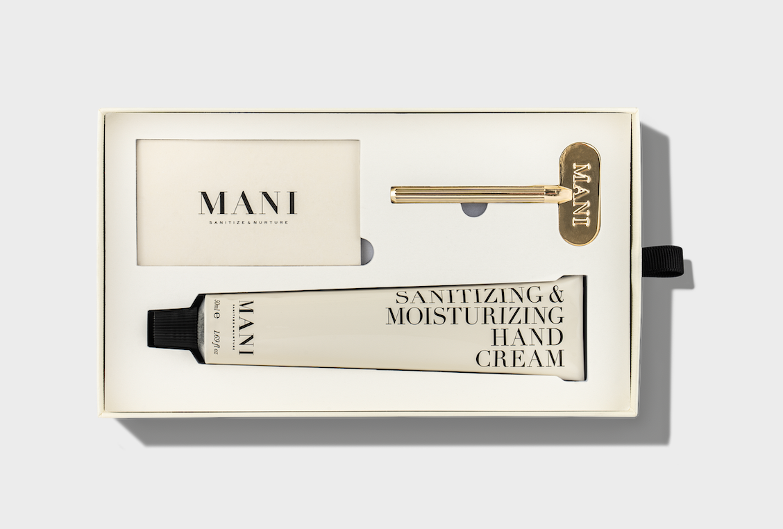 Mani sanitizing and moisturizing hand cream set with packaging on a light gray background