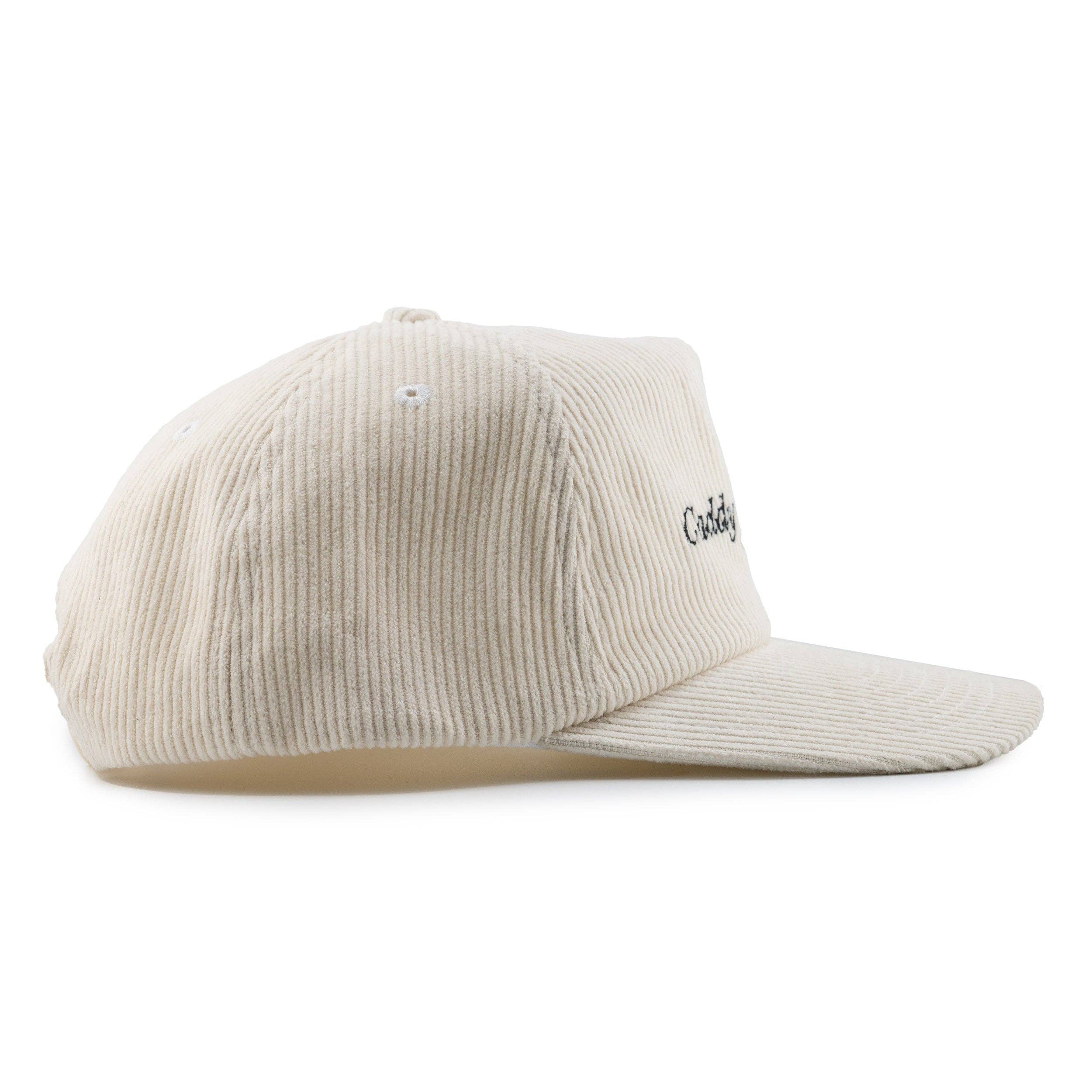 Beige corduroy cap with a brand logo on a white background