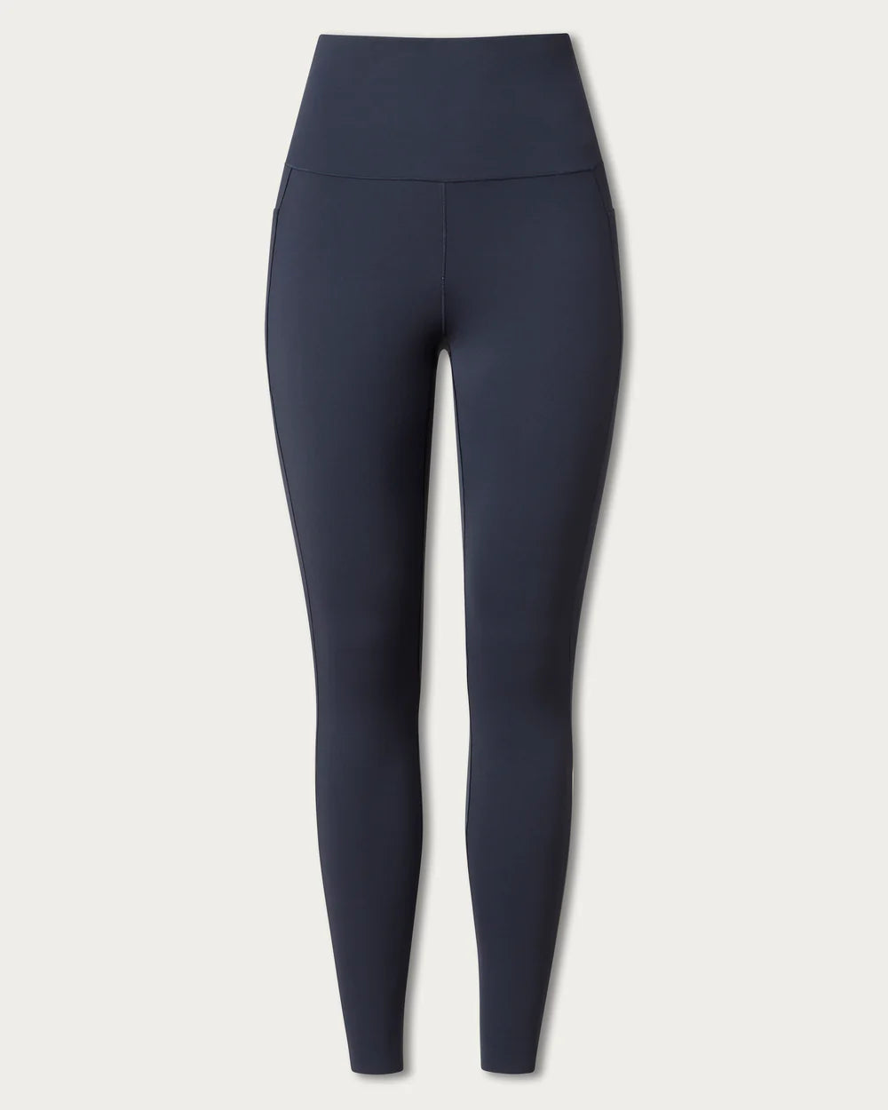 Navy blue leggings on a light gray background