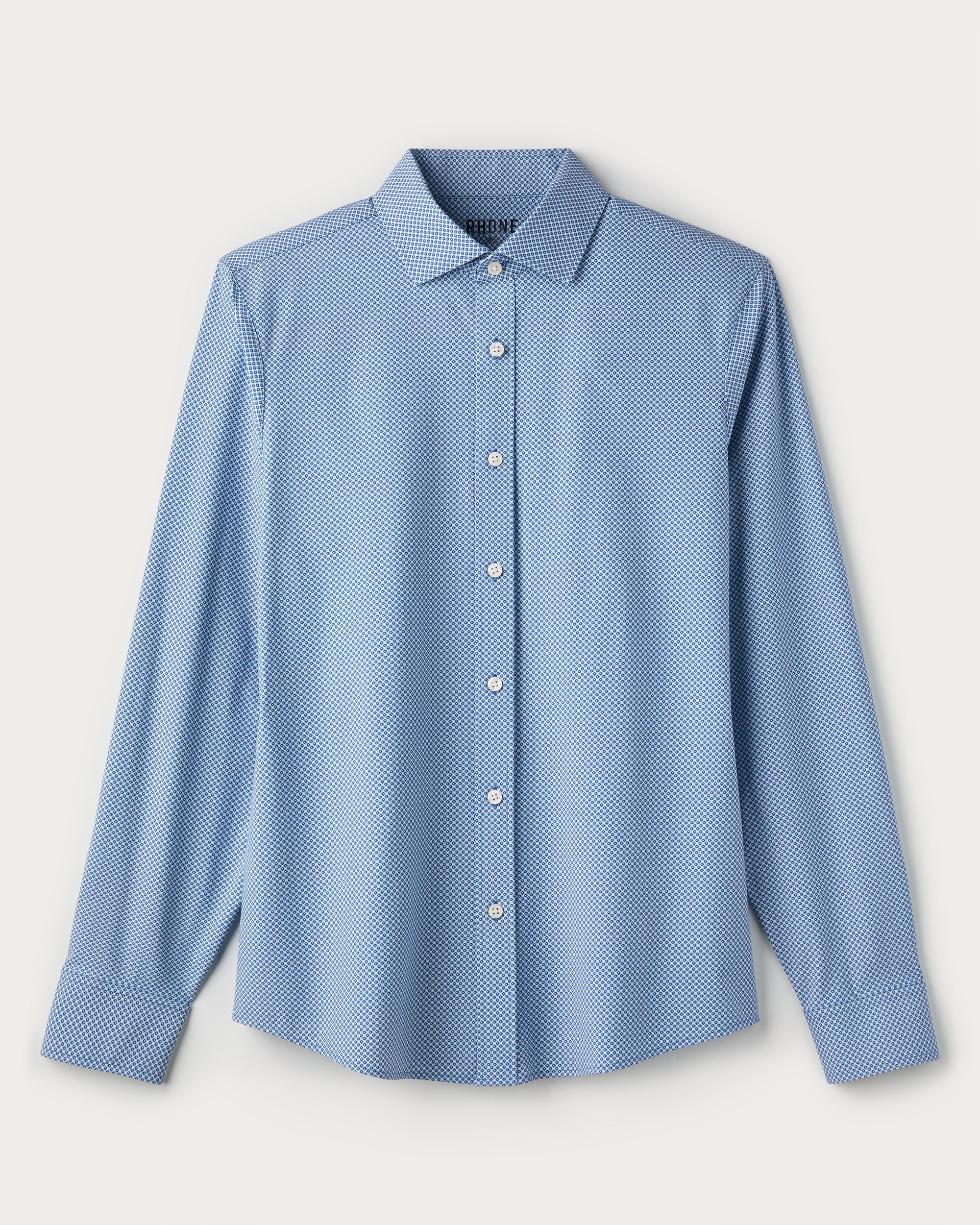 Blue patterned shirt on a light gray background