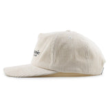 Beige corduroy cap on a white background