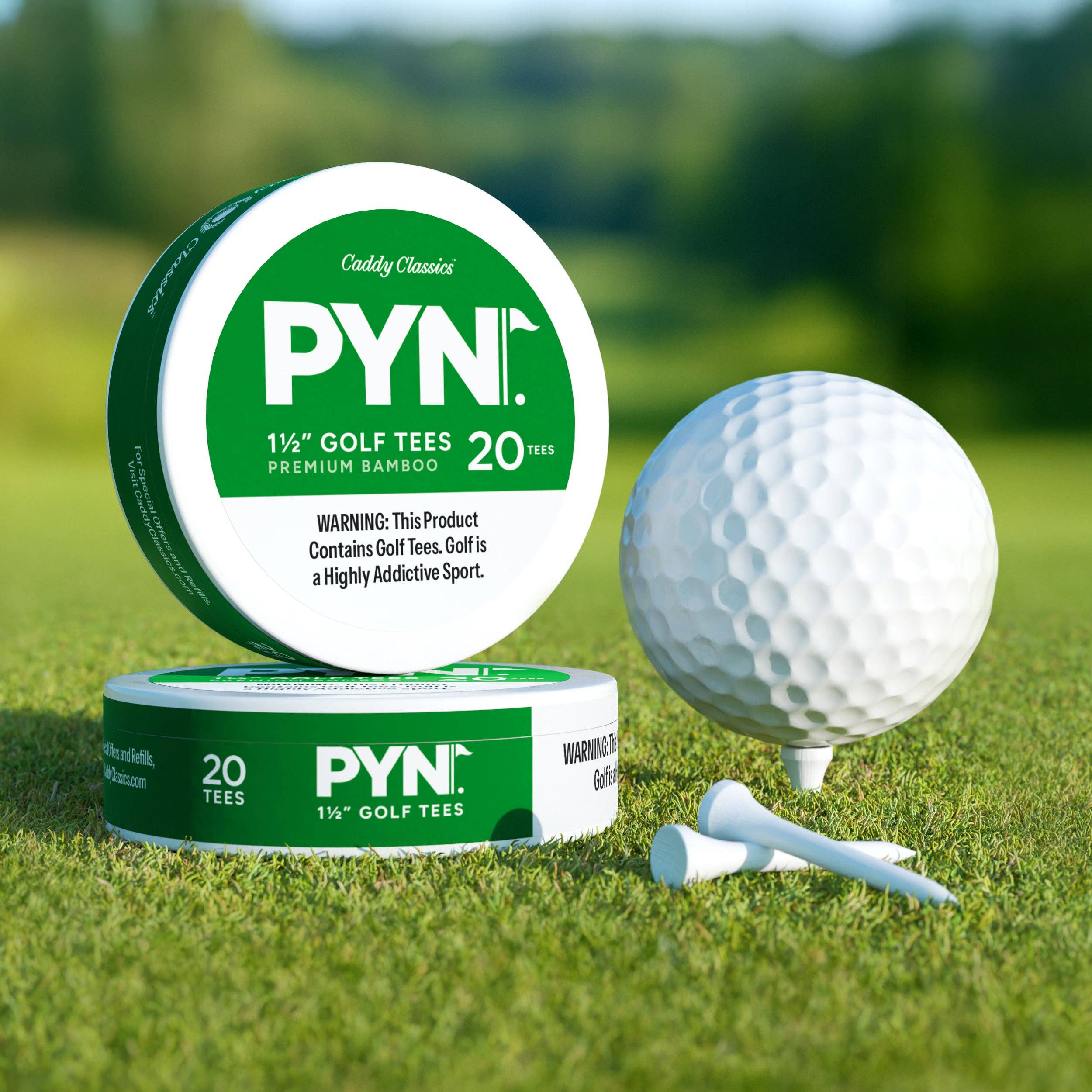 PYN golf tees packaging with a golf ball and tees on grass